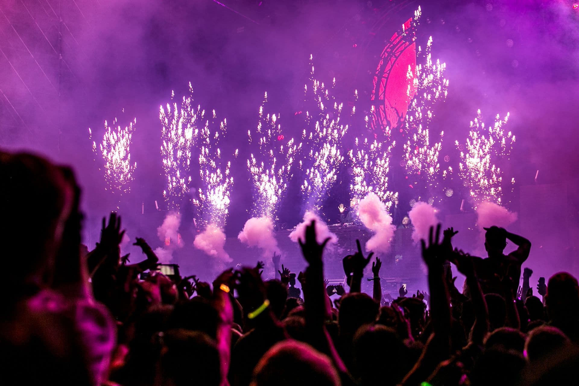 Confetti falling over a crowded dance floor