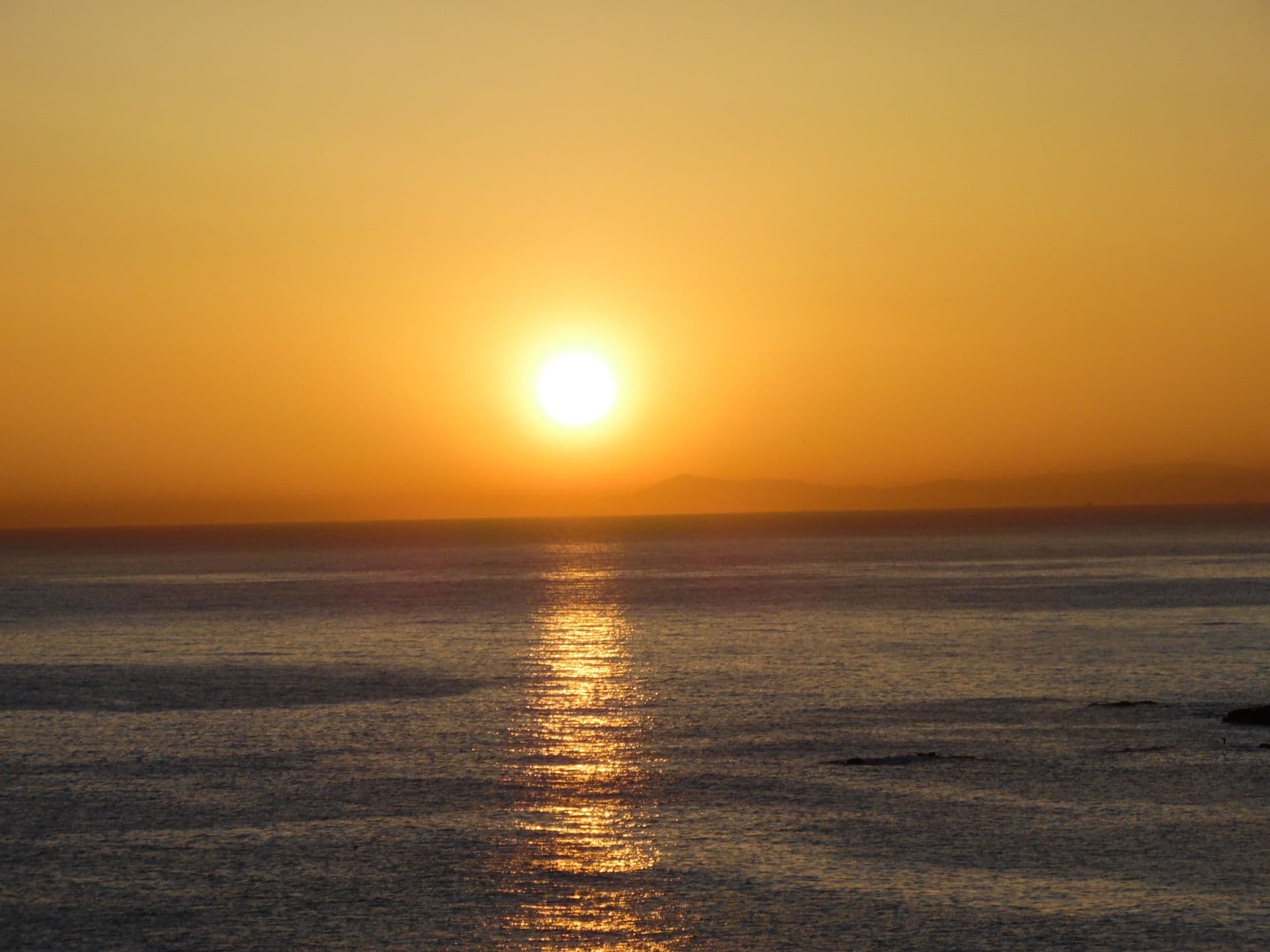 Golden sunset over a calm ocean