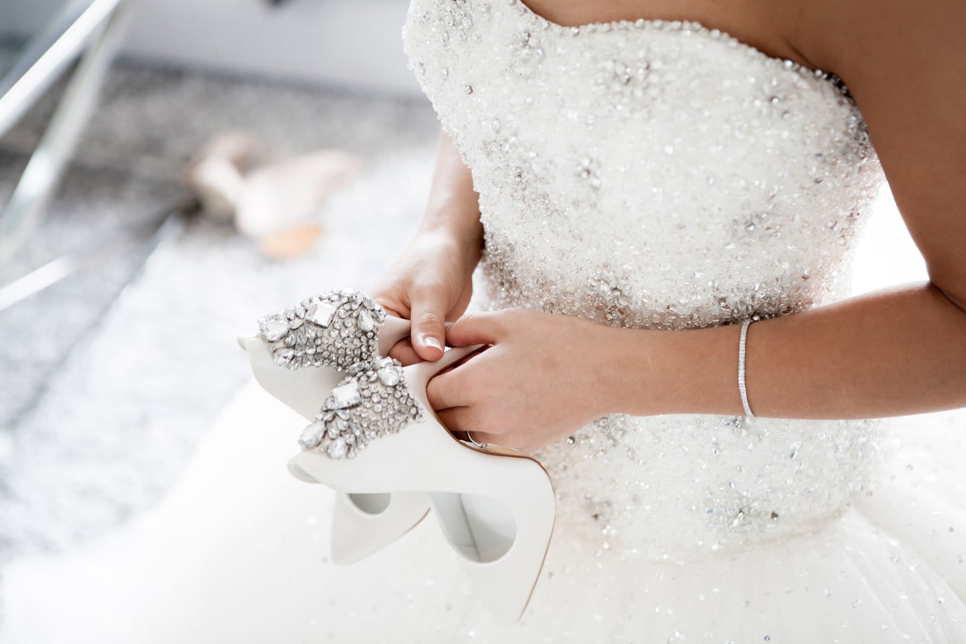 Bride holding a white bouquet